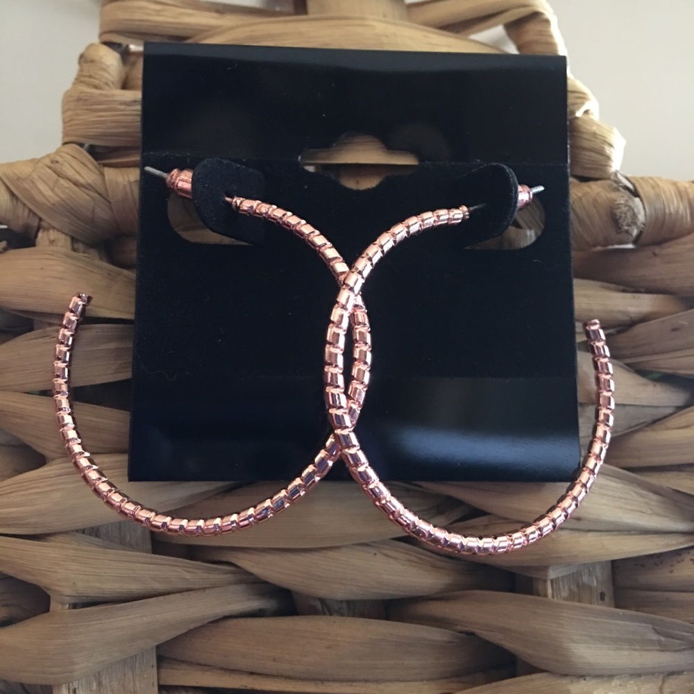 Rose gold tone textured hoop earrings